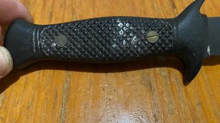 Herramienta de camping con brújula