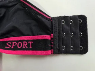 Sujetador deportivo negro y rosa