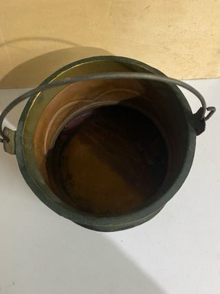 Pentola in rame con manico