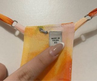 Blusa tirantes flores naranja y amarillo Talla XS