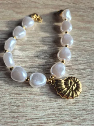 Pulsera Perlas Acero Dorado