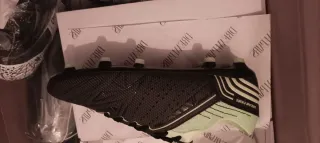 Botas de fútbol Dream Pairs negras y verdes