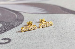 Pendientes brillo lineal