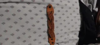 Pulsera trenzada con tachuelas ajustable