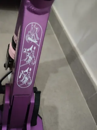 Patinete morado para niña