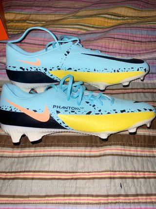 Botas de tacos Nike fútbol azul y amarillo
