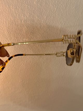 Occhiali da sole Miu Miu dorati originali