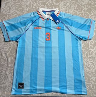 Maglietta Adidas a strisce blu e arancione