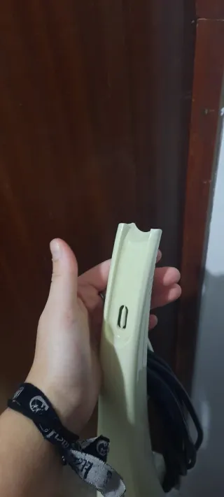 Aspiradora de mano 1400W naranja y blanca