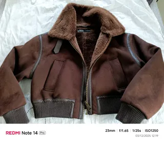 Chaqueta doble faz marrón. Me costó 59.99€.