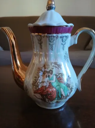 Portacaffè con piatto decorato