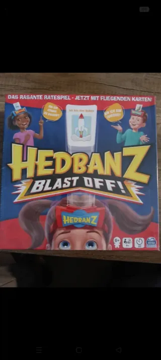 Hedbanz Blast Off! Juego de mesa en alemán