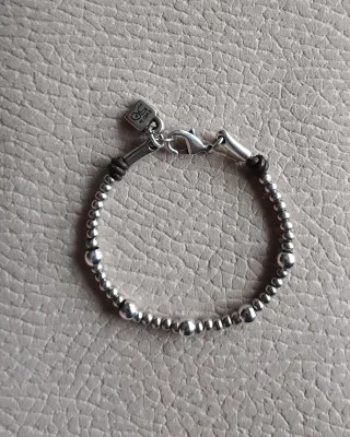 Pulsera Uno de 50 Bolitas Plata y Cuero