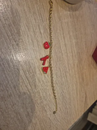 Pulsera acero con charms rojos