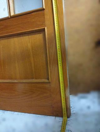 Puerta maciza madera con cristale ,