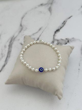 Pulsera perlas y ojo turco azul