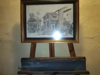 Caballete de madera con cuadro