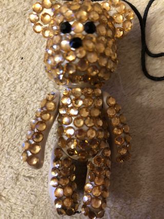 Colgante oso con pedrería dorada