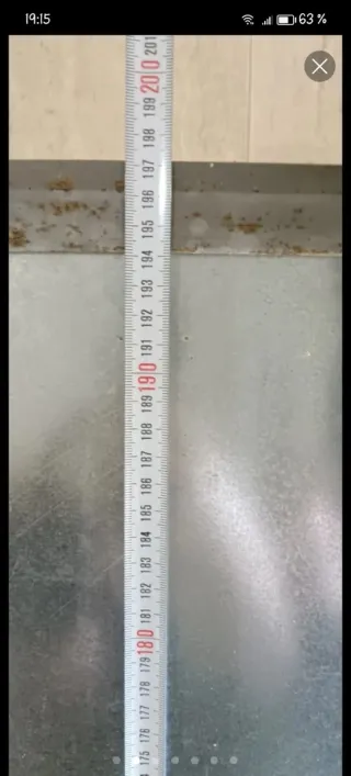 Puerta exterior galvanizada y madera