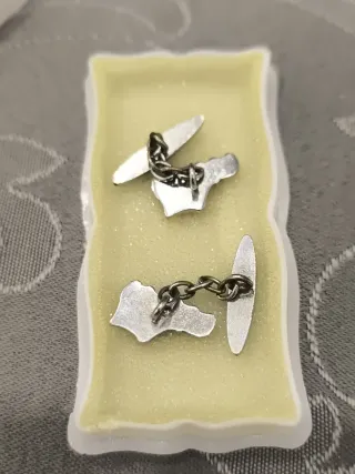 Gemelos de zapato plateados