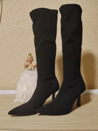 Stivali, borse, scarpe da ginnastica