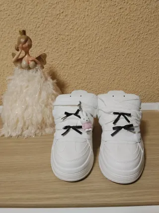 Stivali, borse, scarpe da ginnastica