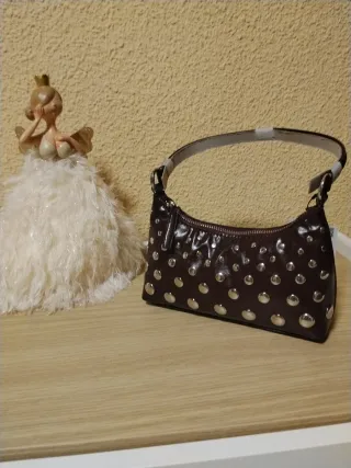 Stivali, borse, scarpe da ginnastica