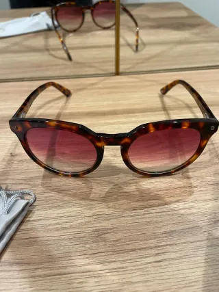 Gafas de sol redondas, pasta marron, lente rosa