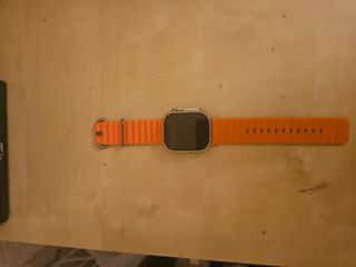 Apple Watch Naranja/Plata con Cargador