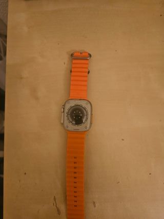 Apple Watch Naranja/Plata con Cargador