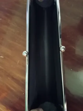 Bolso de fiesta plateado con pedrería