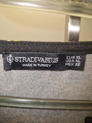 Jersey punto cadenas negro y dorado