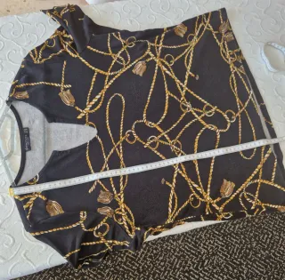 Jersey punto cadenas negro y dorado