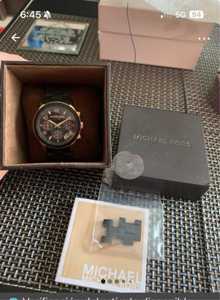 Reloj Michael Kors Negro y Dorado nuevo a estrenar
