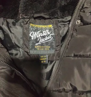 Abrigo largo con gorro de pelo