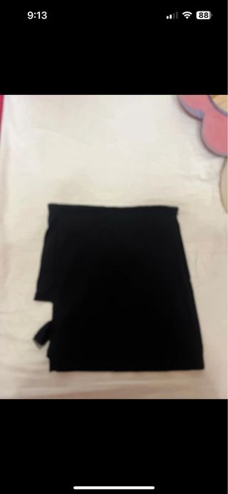 Falda negra Shein con hebillas