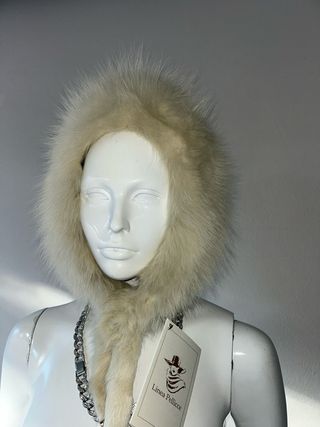 Cappello in pelliccia beige e bianco