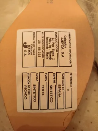 Zapatos Comarelli blancos con plumas