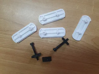 2 tornillos con tuercas y 4 patas Stokke