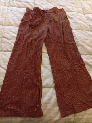 Pantaloni larghi a righe dorate