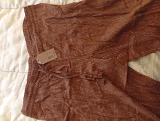 Pantaloni larghi a righe dorate