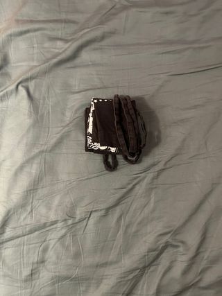 Bolso negro con estampado DC Comics