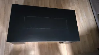 Mesa de centro moderna negra elevable.