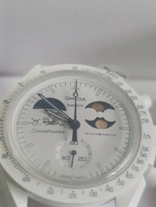 Swatch Omega Snoopy Moonshine Gold 4 Dic