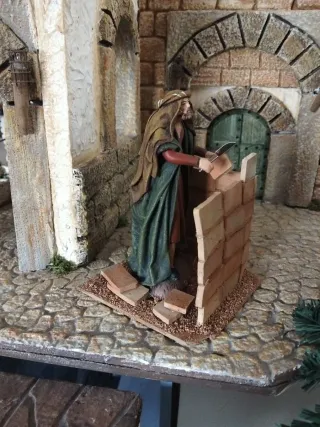 Pastor albañil belén