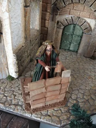 Pastor albañil belén