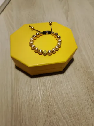 Pulsera Tesor Paris dorada y amarilla