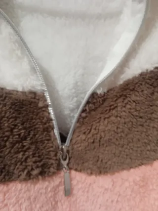 Polar pelito con cremallera y rayas