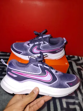Zapatillas Nike Running Moradas y Rosas