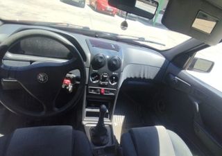 Alfa romeo faro izq 146 2.0 td 1994-1999 97007